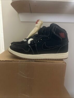 Nike Kids Black High-Top Sneakers with Red Logo Accent